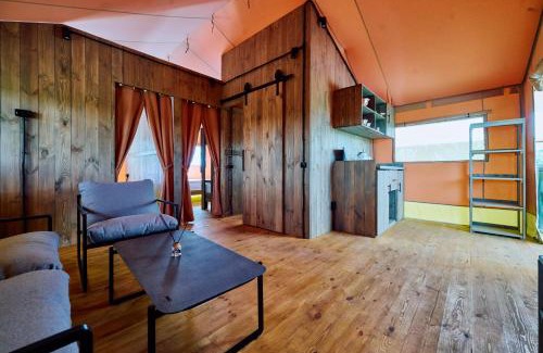 Klavdiyevo-Tarasove Apartamento | Апартаменти Тоскана в Сімейному Екопарку Ясногородка