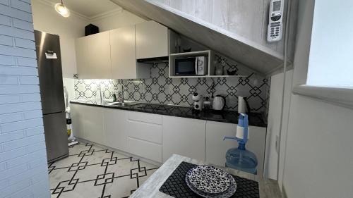 Kamenets-Podol'skiy Apartamento | Апартаменти - Історія з вікна