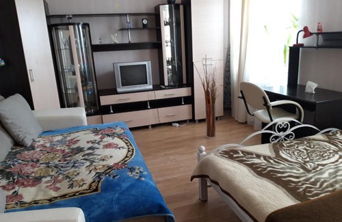 Bryansk Apartamento | Дом с часами на площади Партизан