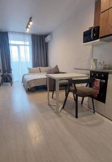 Shevchenkivs'kyi District Apartamento | Затишна, стильна студія біля Виставкового центру