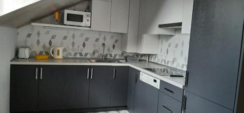 Kamenets-Podol'skiy Apartamento | Сонячна мансарда
