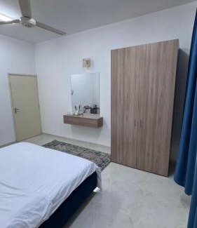 Nizwa Apartamento | الذهب الزرق للشقق الفندقية فرق