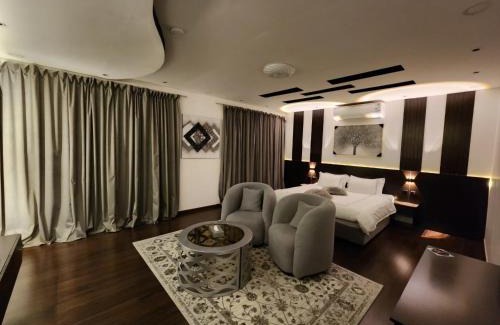 Taif Apartamento | جناح فاخر بوصول ذاتي وفناء مطل