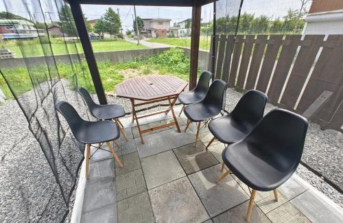 Shiraoi Casa | 天然温泉付快適なログハウス ヴィレッジR 屋根付bbq設備あり