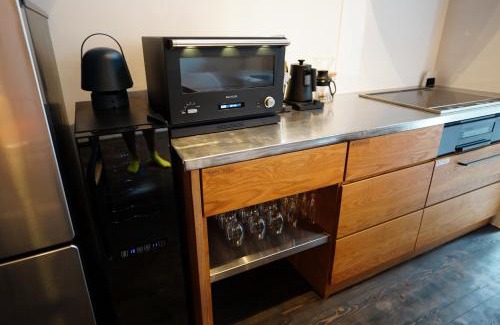 Aso Apartamento | 寝室から一望できる阿蘇山の絶景!築200年の歴史ある米蔵をリノベーションした一棟貸しの宿