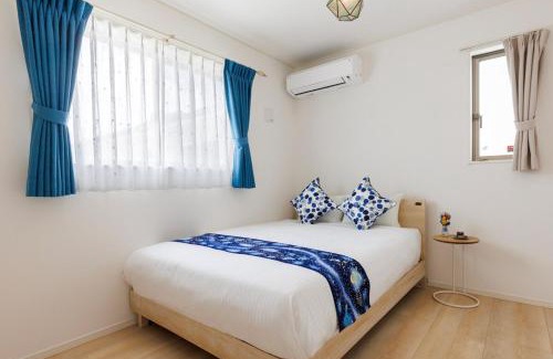 Nagawa Apartamento | 那覇空港から15分DMM水族館とイーアス豊崎近く最大10名oKの南部リゾート宿OKS inn