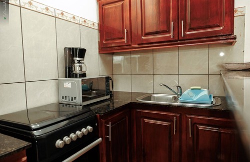 Kotu Apartamento | 1 Bedroom Apartments | kitchen | Free Wifi | Daily Cleaning | AC | Cable | Pool