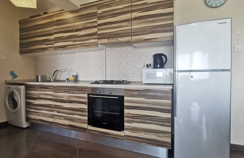 Trikomo Apartamento | NUEVO (2014) PISO DE 1 DORMITORIO CON VISTAS AL MAR PANORÁMICAS, 200 METROS A LA PLAYA DE LANDY LONG