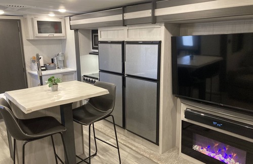 Port Bolivar Casa | 10 minutes walk to the beach .Covered rv spot on concrete slab. NEW CAMPER