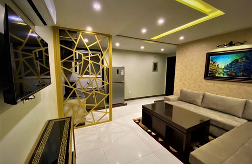 Bahria Town Apartamento | 101 - Experience Luxury Living with Modern Amenities
