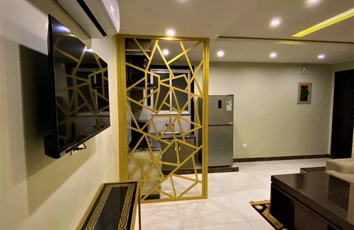 Bahria Town Apartamento | 101 - Experience Luxury Living with Modern Amenities