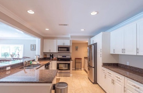 North Forest Beach Casa | 11 Sandpiper St - Sandpiper Oasis Large Pool and Putting Green