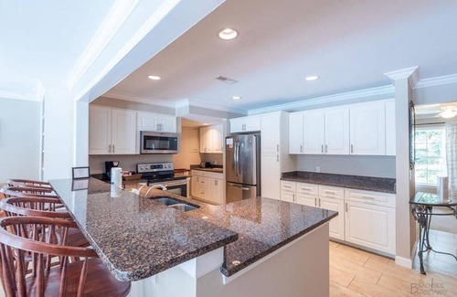 North Forest Beach Casa | 11 Sandpiper St - Sandpiper Oasis Large Pool and Putting Green