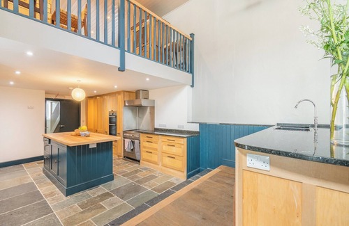 Pembroke Cabaña | The ultimate celebration house full of character with a bar, studio, pool table and table tennis.