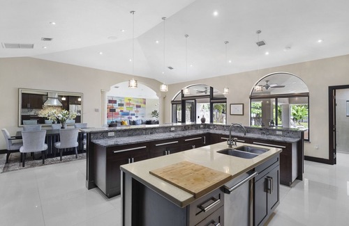 Riverside Park Casa | 144' New River Dock DT! Sailfish Pool, Hot Tub, Pontoon & Fire Lounge Luxury!