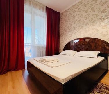 Nur-Sultan Apartamento | 153 С прекрасным видом на Байтерек и 2 большими кроватями