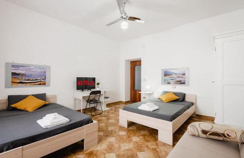 Alghero Apartamento | 15min a piedi dal centro appartamento con Patio Privato!