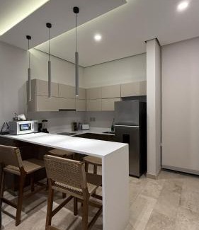 Playa Paraiso Apartamento | 1BR con entrada gratuita club de playa hábitas