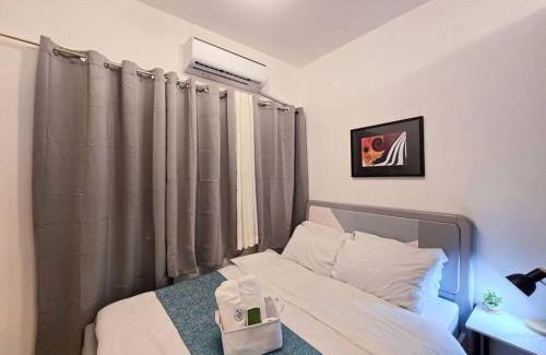 Highway Hills Apartamento | 1BR Condotel with Balcony at FAME Residences #FM23
