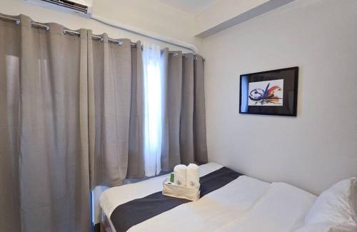 Highway Hills Apartamento | 1BR Condotel with Balcony at FAME Residences #FM30