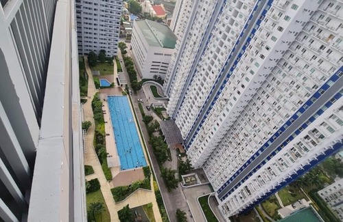 Bagong Lipunan Ng Crame Condominio | 1BR w/balcony nr SM North| Parking | WIFI |Netflix