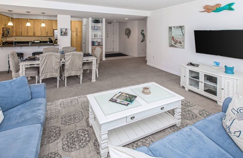 Sandbridge Condominio | 1st-floor condo with balcony, W/D, outdoor pool, gym & grills