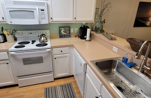 Bolivia Condominio | 1st floor Winding River 2 bed condo with Beach house on Holden!!