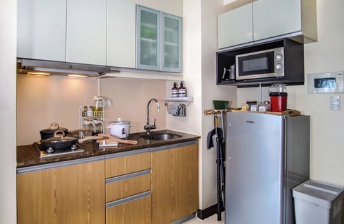Forbes Park Apartamento | 1Up Mario Retreat with Private Cinema and Game Console