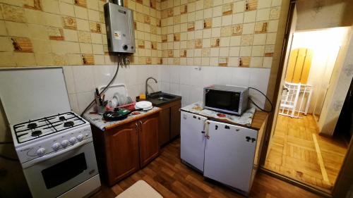 Sukhinovka Apartamento | 2 кімнатна Квартира подобово у центрі Полтави біля ЦУМу з власною закритою парковкою Документи для відрядження Мережа квартир