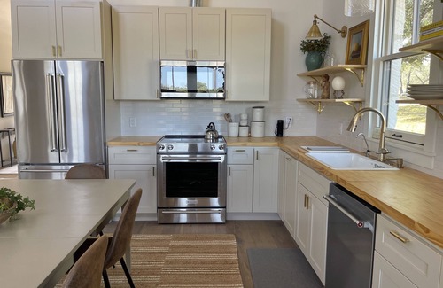 Johnson City Casa | 2 bedroom/2 bath stone farmhouse overlooking hill country creek on 50 acres