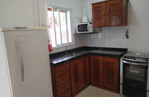 Ipiranga Apartamento | Apartamento de 2 dormitorios, amueblado con piscina, patio y barbacoa