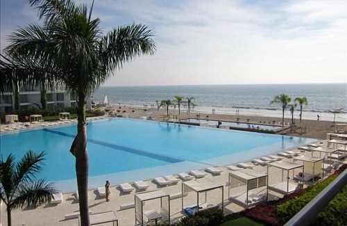 Flamingos Condominio | Condominio de 2 dormitorios frente al mar, hermosas vistas al mar y a la piscina