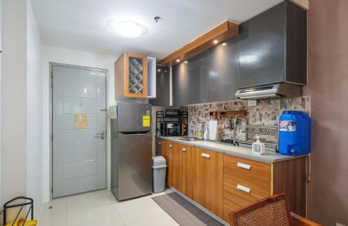 Santo Cristo Apartamento | 2-Bedroom Condo QC Grass Residences SM North EDSA