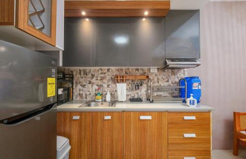 Santo Cristo Apartamento | 2-Bedroom Condo QC Grass Residences SM North EDSA