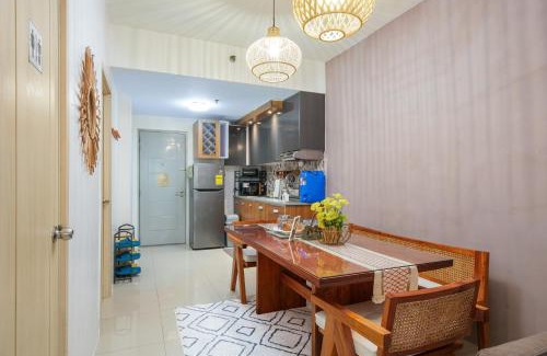 Santo Cristo Apartamento | 2-Bedroom Condo QC Grass Residences SM North EDSA