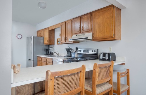 Sea Acres Casa | 2 bedroom condo with WiFi, outdoor shower, and access to Georgetown Sands community pool and tennis