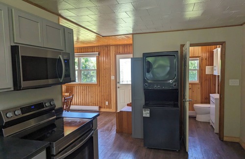 Inverness County Cabaña | 2-Bedroom Cottage On Lake Ainlsie Private Beach, Enjoy Fishing & Swimming.