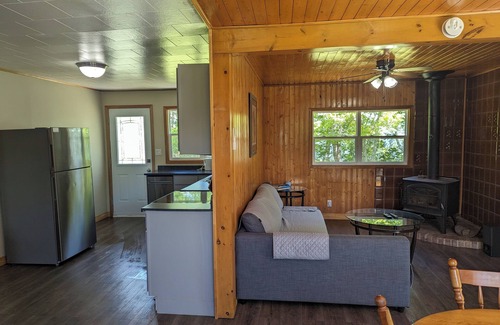 Inverness County Cabaña | 2-Bedroom Cottage On Lake Ainlsie Private Beach, Enjoy Fishing & Swimming.