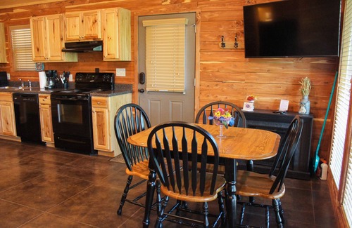 Swinging Bridge Village Cabina | 2 Bedroom Little Red Riverfront Cabin on Winkley Shoals