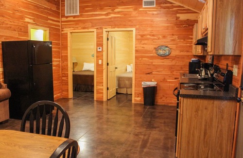 Swinging Bridge Village Cabina | 2 Bedroom Little Red Riverfront Cabin on Winkley Shoals
