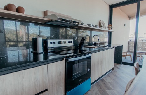 El Zonte Condominio | 2-Bedroom Partial Ocean View with Balcony (King Master Plus Bunk Beds)