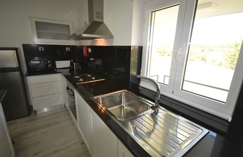 Campos Casa | Villa de 2 dormitorios con jardines y piscina.