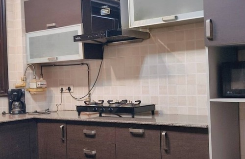 Greater Kailash Apartamento | 2 BHK near M Block Market GK-1 by HostMyStay