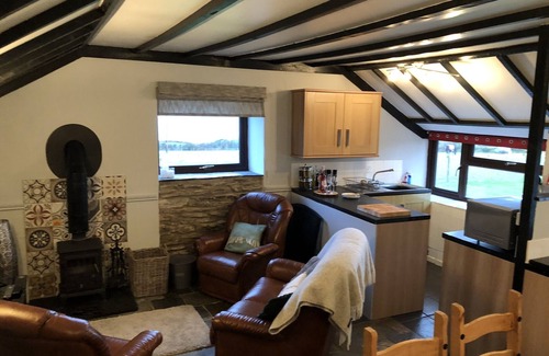 Felinwynt Cabaña | 2 cabañas de Byre: acogedoras cabañas para perros con impresionantes vistas al mar