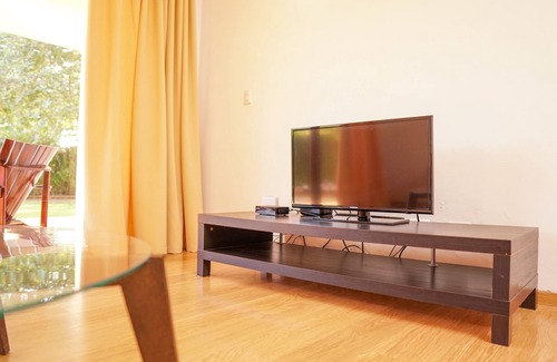 Guayacanes Apartamento | 2. Cómodo apartamento de 1 habitación con jardín