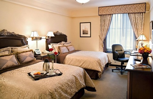 Central Park West Hotel | 2 Deluxe Suite Two Queen Beds at The Lucerne Hotel!
