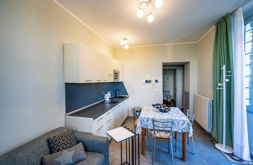 Carciano Apartamento | Magnífico apartamento en una prestigiosa villa de estilo Art Nouveau con piscina y espectaculares vistas al lago