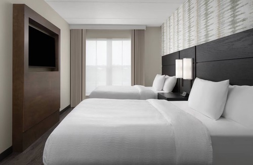 Isle of Palms Hotel | 2 Spacious Suites w/ Kitchen, Free Breakfast, and Heated Pool Near Mayo Clinic