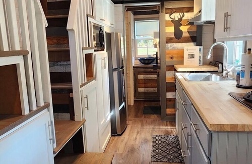 Mill Spring Casa | 2-story tiny home on the creek, full kitchen, close to pool and playground, sleeps 4.
