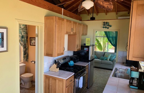 Estate Calabash Boom Cabaña | Aquí viene el sol: la vida en la isla con las comodidades del hogar